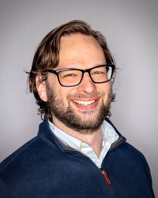 A portrait of Cary Malkiewich.